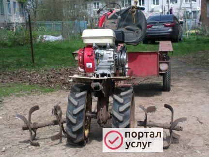 Фото Вспашка земли мотоблоком