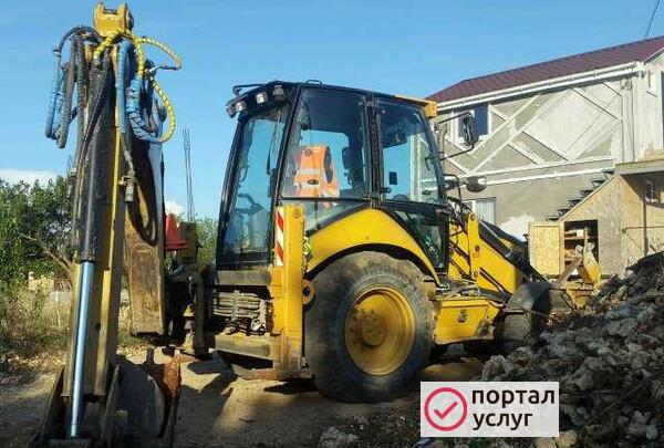 Фото Экскаватор-погрузчик