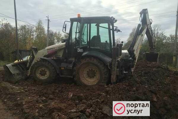 Фото Экскаватор погрузчик