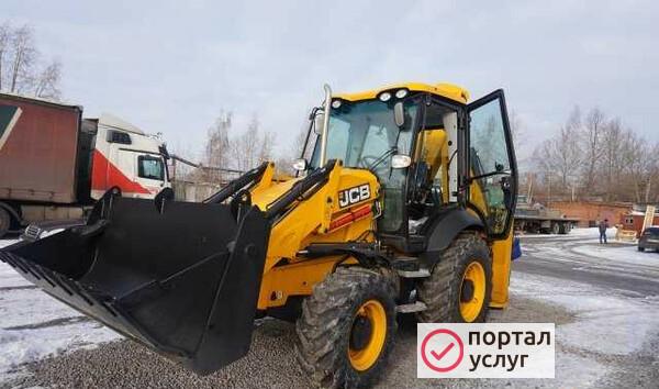 Фото Экскаватор-погрузчик JCB с гидромолотом