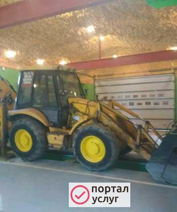 Фото Экскаватор-погрузчик
