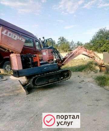 Фото Мини эксковатор