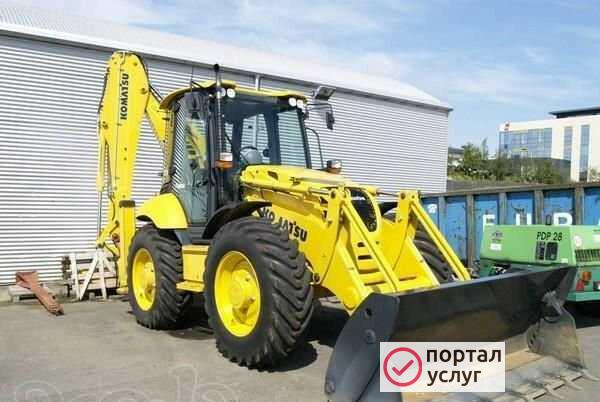Фото Услуги экскаватора - погрузчика