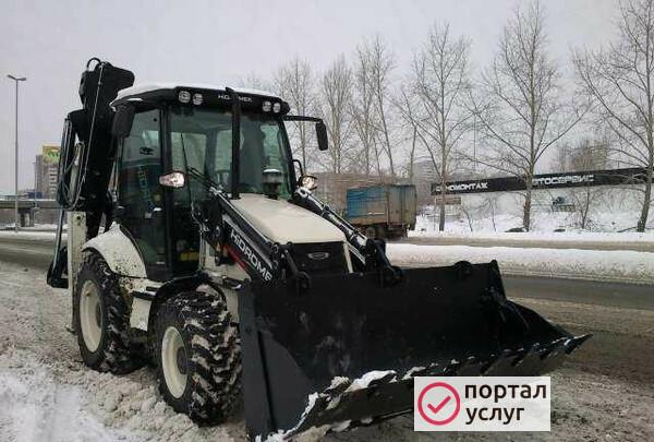 Фото Экскаватор погрузчик - ямобур