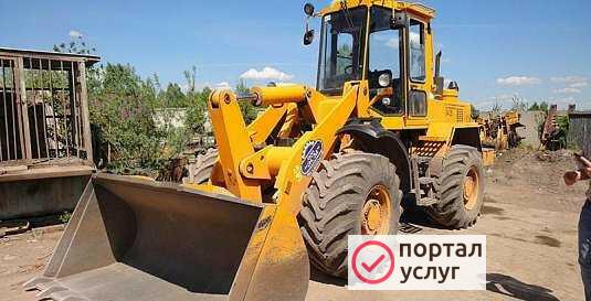 Фото Фронтальный погрузчик