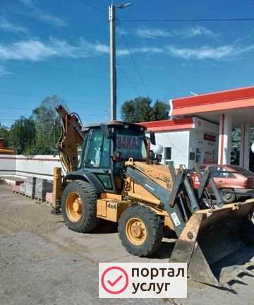 Фото Услуги экскаватора погрузчика