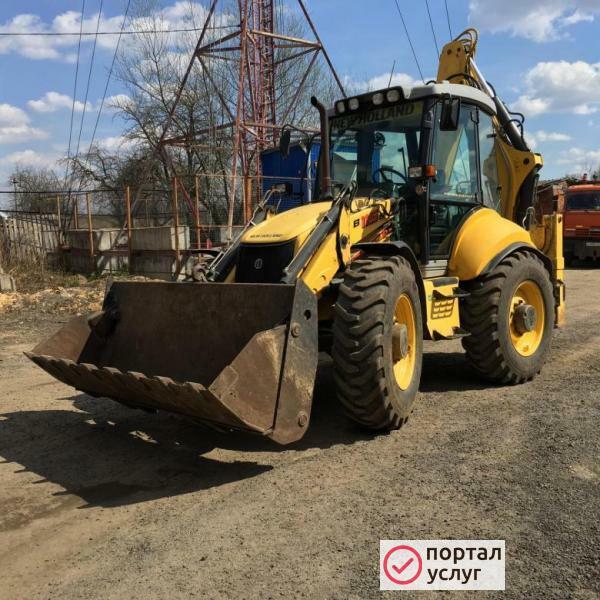 Фото Эксковатор погрузчик