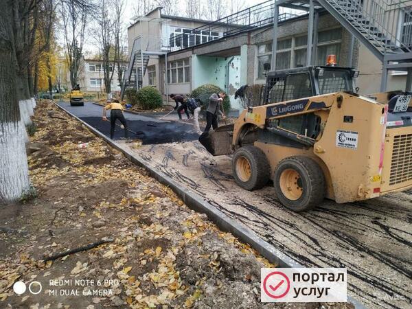 Фото Асфальтирование дороги 