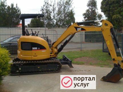 Фото Миниэкскаватор