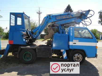 Фото Экскаватор с гидромолотом