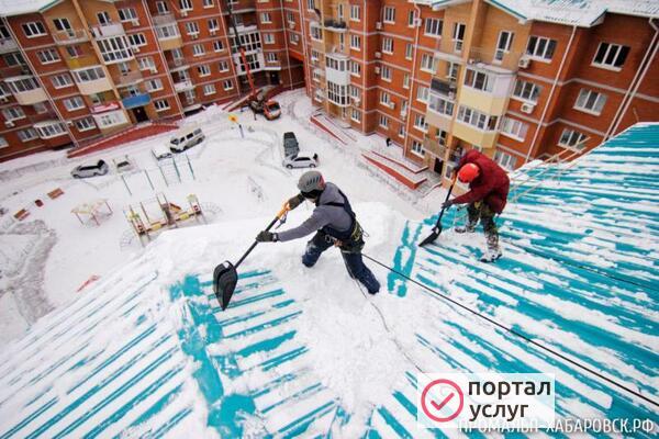 Фото Уборка снега с ровных крыш (кровли) 