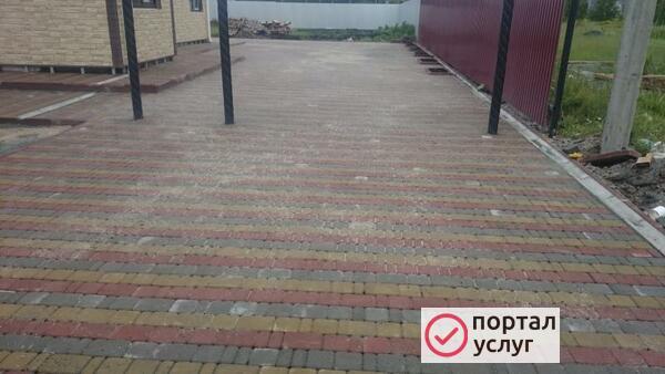 Фото Укладка тротуарной плитки брусчатки 
