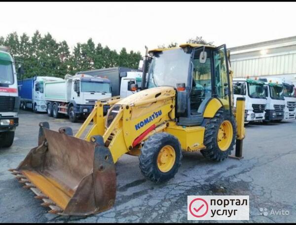 Фото Услуги экскаватора-погрузчика