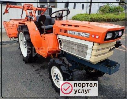 Фото Вспашка земли минитрактор, фрезой