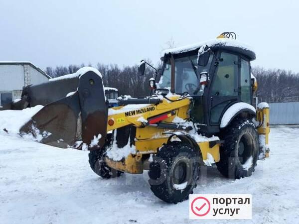 Фото Чистка снега, уборка погрузчиком