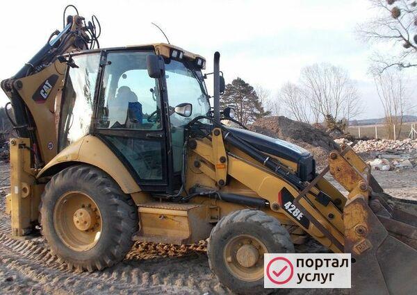 Фото Услуги экскаватора-погрузчика
