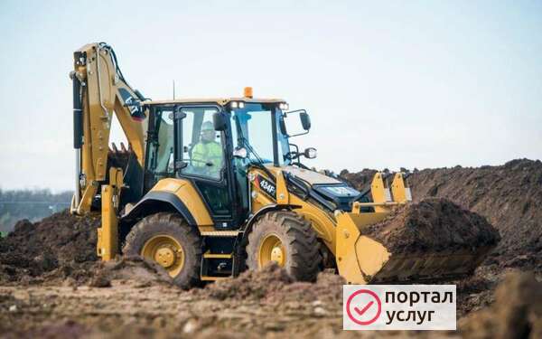 Фото  Услуги Экскаватора- погрузчика Caterpillar!