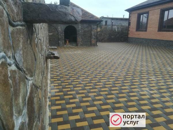 Фото Укладка тротуарной плитки