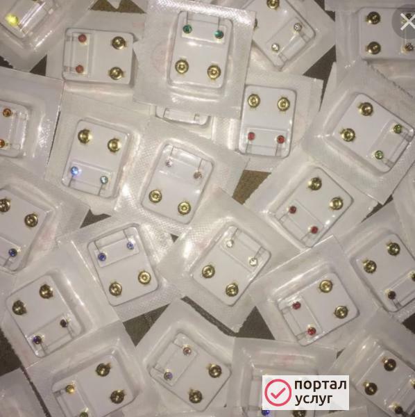 Фото Прокол ушей