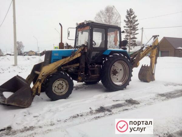 Фото Эксковатор-погрузчик