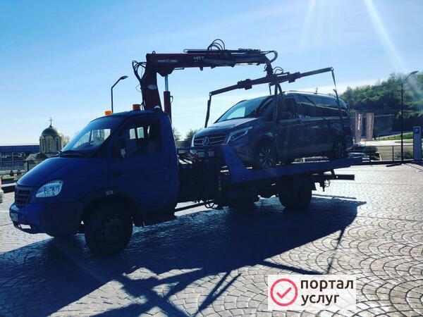 Фото Эвакуатор с манипулятором 