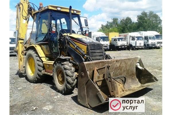 Фото Экскаватор-погрузчик