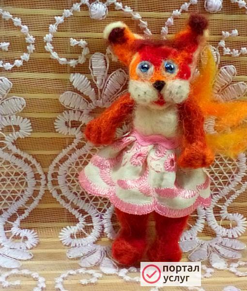 Фото Карманная игрушка Белочка