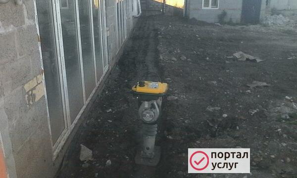 Фото Трамбовка грунта