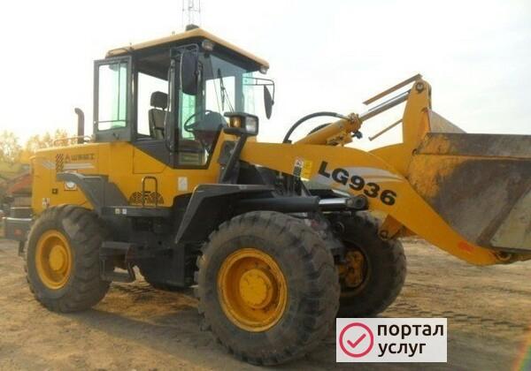 Фото Фронтальный погрузчик