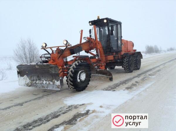 Фото Уборка снега грейдером