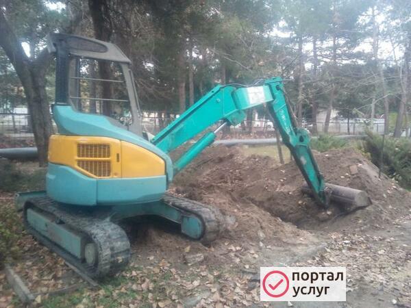 Фото Мини эксковатор погрузчик