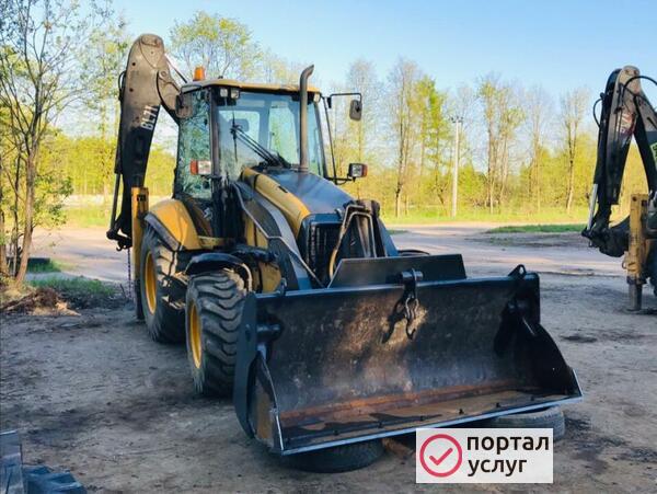 Фото Экскаватор погрузчик в аренду Тайцы