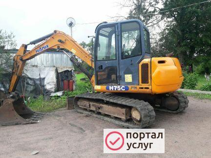 Фото Миниэкскаватор