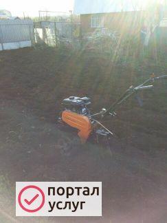 Фото Вспашка земли мотоблоком
