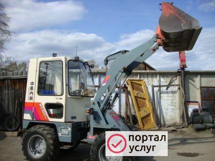 Фото Фронтальный мини погрузчик