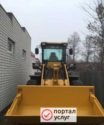 Фото Фронтальный погрузчик