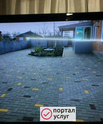 Фото Укладка тротуарной плитки брусчатки