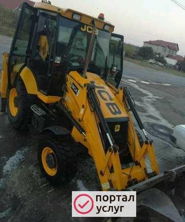 Фото Экскаватор погрузчик