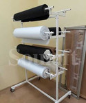 Размоточные устройства для рулонов ткани