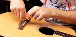 Установка, замена струн и настройка гитары