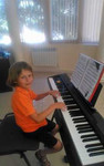 Преподаватель игры на фортепиано