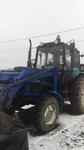 Чистка и погрузка снега тракторами